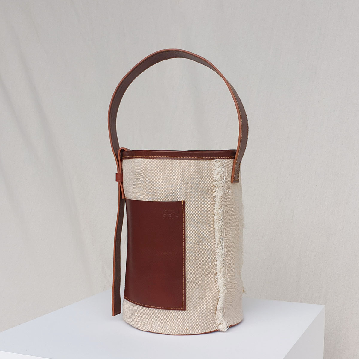 LEATHER CANVAS BUCKET BAG brown